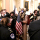 A shirtless man known as the ‘QAnon Shaman’ was one of the high-profile members of Trump supporters who invaded the US Capitol.